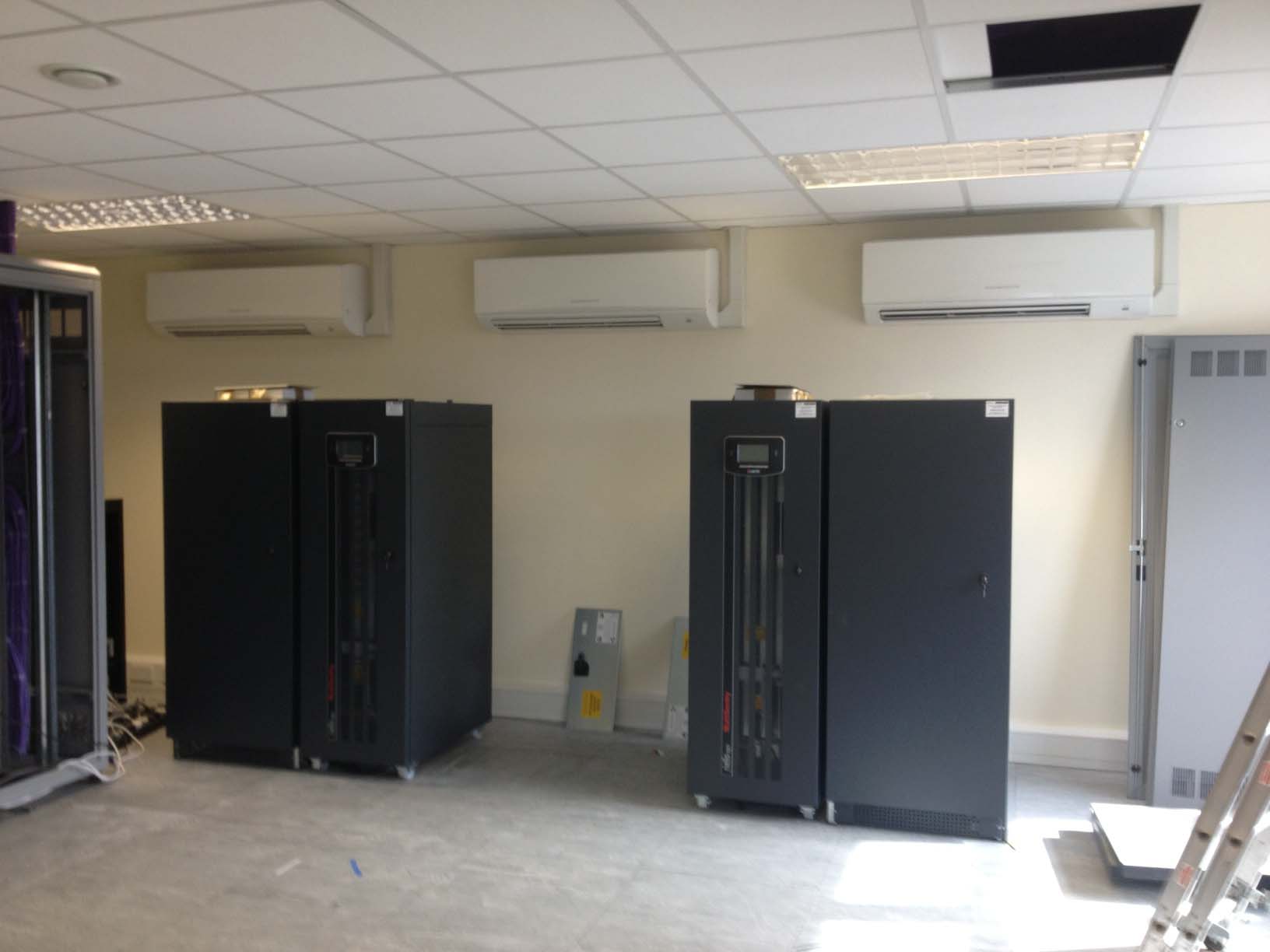 wall mounted air conditioning units mounted on the side of the server room in case of any future water failure